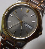 Citizen Men's Quartz Gold Dual Calendar Watch w/ Bracelet