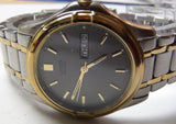 Citizen Men's Quartz Gold Dual Calendar Watch w/ Bracelet