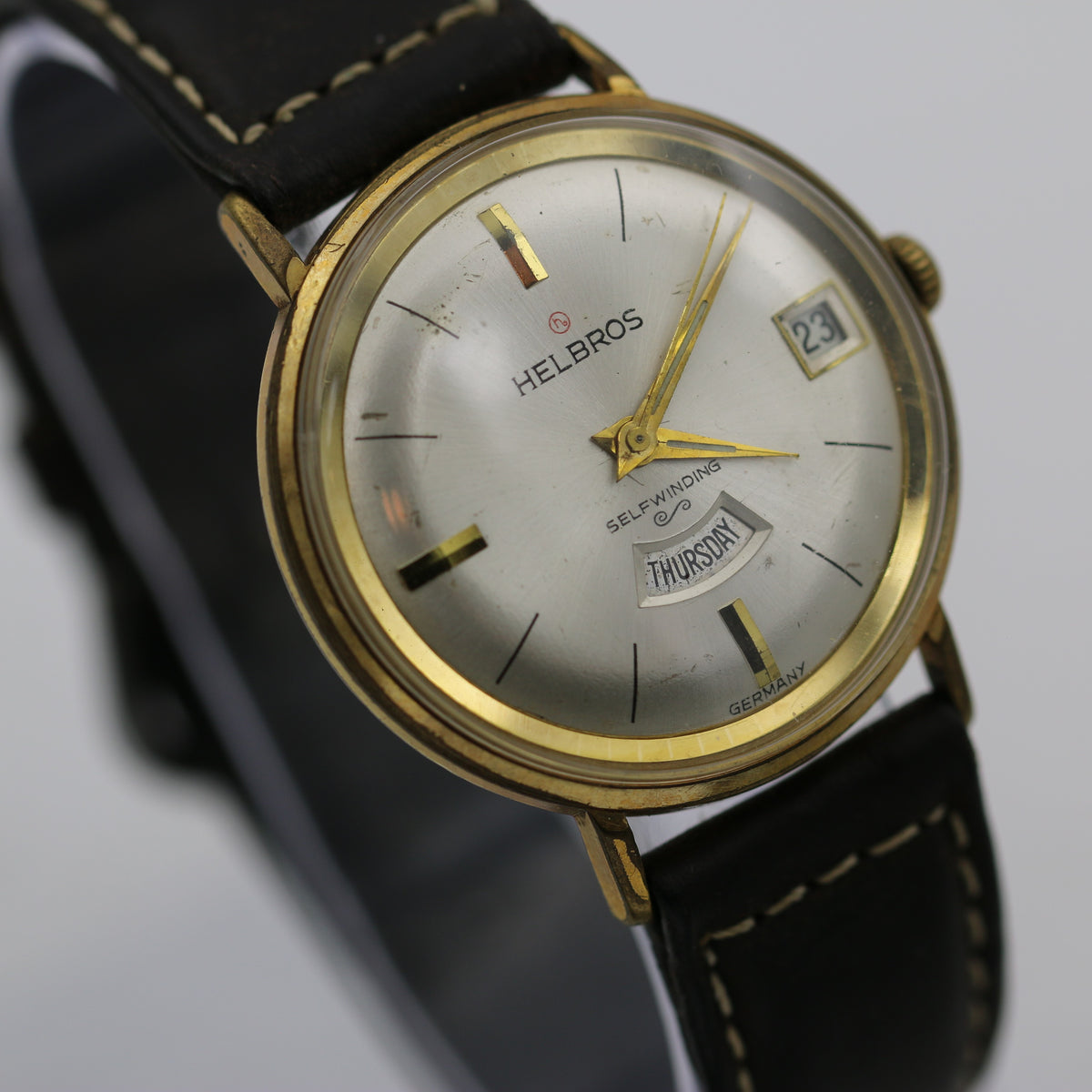 Vintage Helbros offers Swiss Made Mechanical Gold Wrist Watch with Date Dial