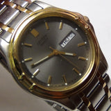 Citizen Men's Quartz Gold Dual Calendar Watch w/ Bracelet