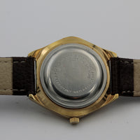 1970s Stellaris Men's 17Jwl Automatic Calendar Gold Watch w/ Strap