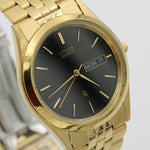 Citizen Men's Quartz Gold Dual Calendar Watch w/ Bracelet