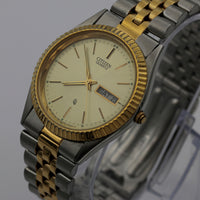 Citizen Men's Quartz Gold Dual Calendar Coin Bezel Watch w/ Bracelet