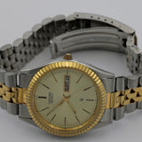 Citizen Men's Quartz Gold Dual Calendar Coin Bezel Watch w/ Bracelet