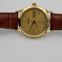 Seiko Men's Dual Calendar Gold Quartz Watch w/ Strap